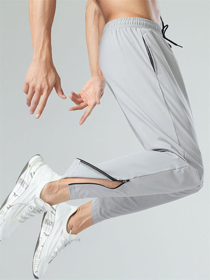 Ice silk quick-drying breathable fitness drawstring casual side zipper trousers kakaclo